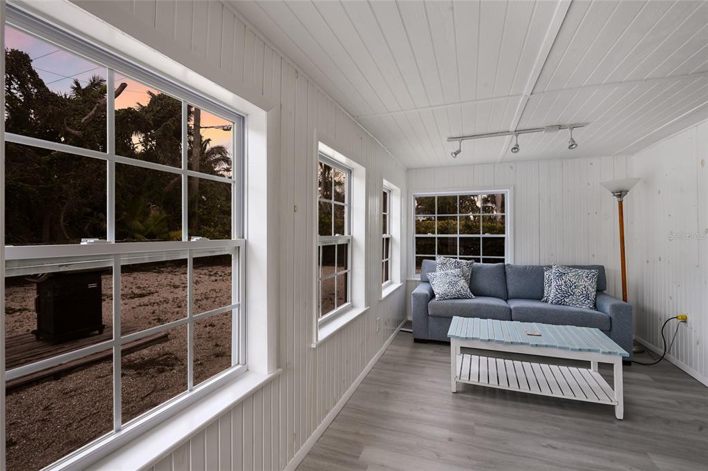 120 Maple Avenue Anna Maria, FL 34216 - Photo 24 of 39 a living room with furniture