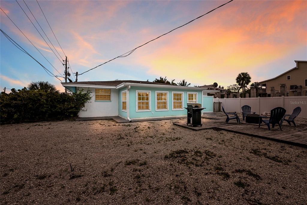 120 Maple Avenue Anna Maria, FL 34216 - Photo 26 of 39 a house view with a backyard space