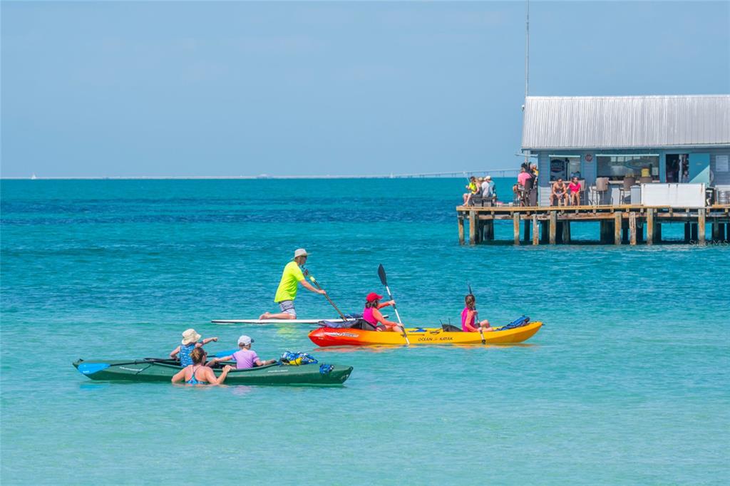 120 Maple Avenue Anna Maria, FL 34216 - Photo 33 of 39 a play ground with swimming pool table and chairs