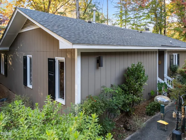 a backyard of a house with lots of green space