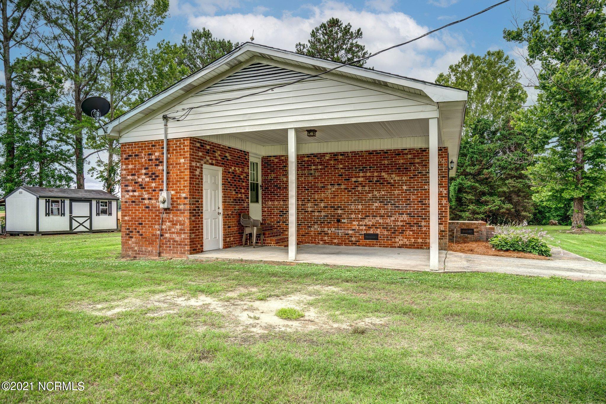 2868 Clemmons School Road Stokes, NC 27884 - Photo 17 of 19 Nice carport.
