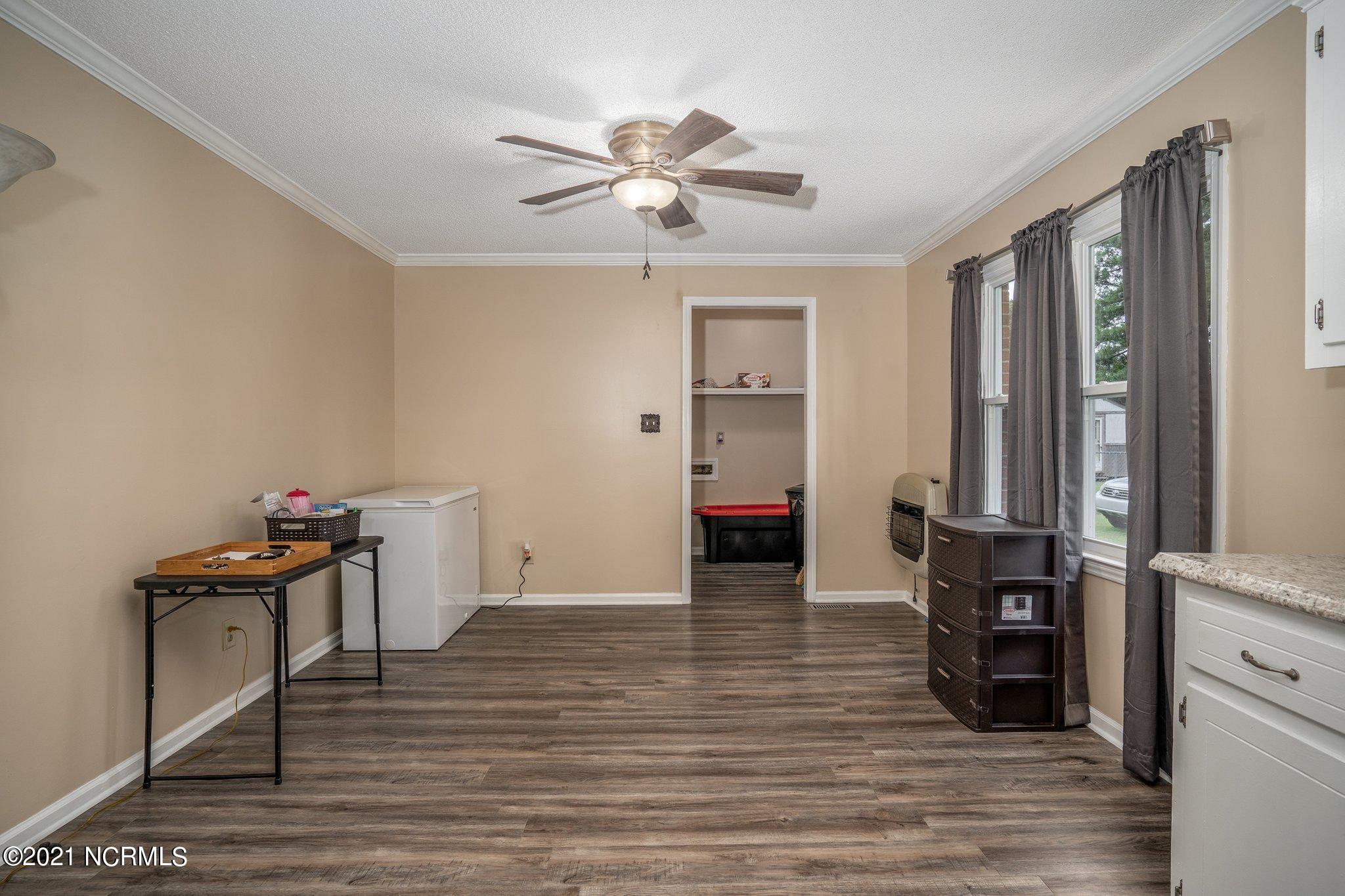 2868 Clemmons School Road Stokes, NC 27884 - Photo 5 of 19 OPen kitchen to eat-in area.