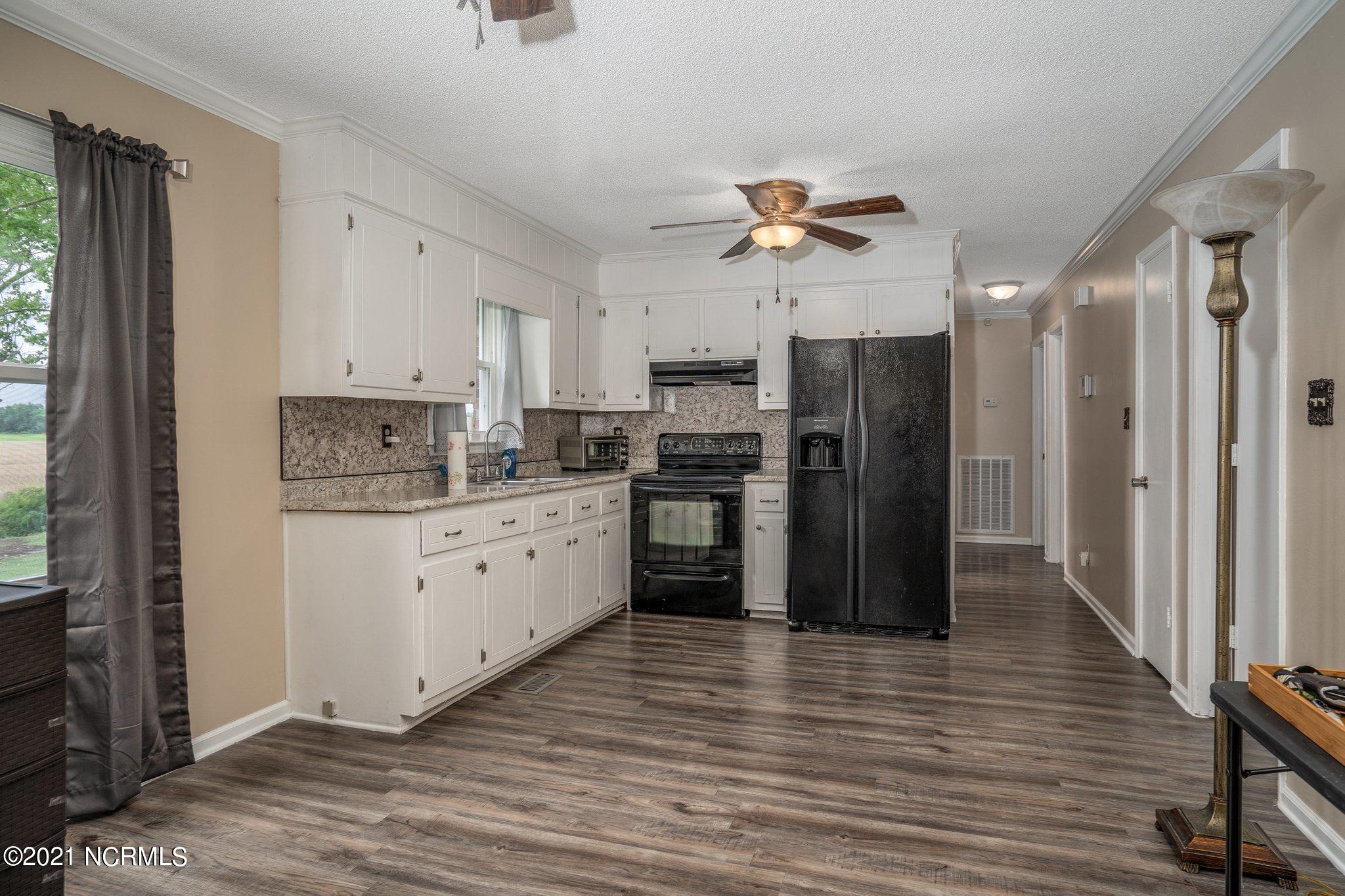 2868 Clemmons School Road Stokes, NC 27884 - Photo 7 of 19 Roomy open kitchen!