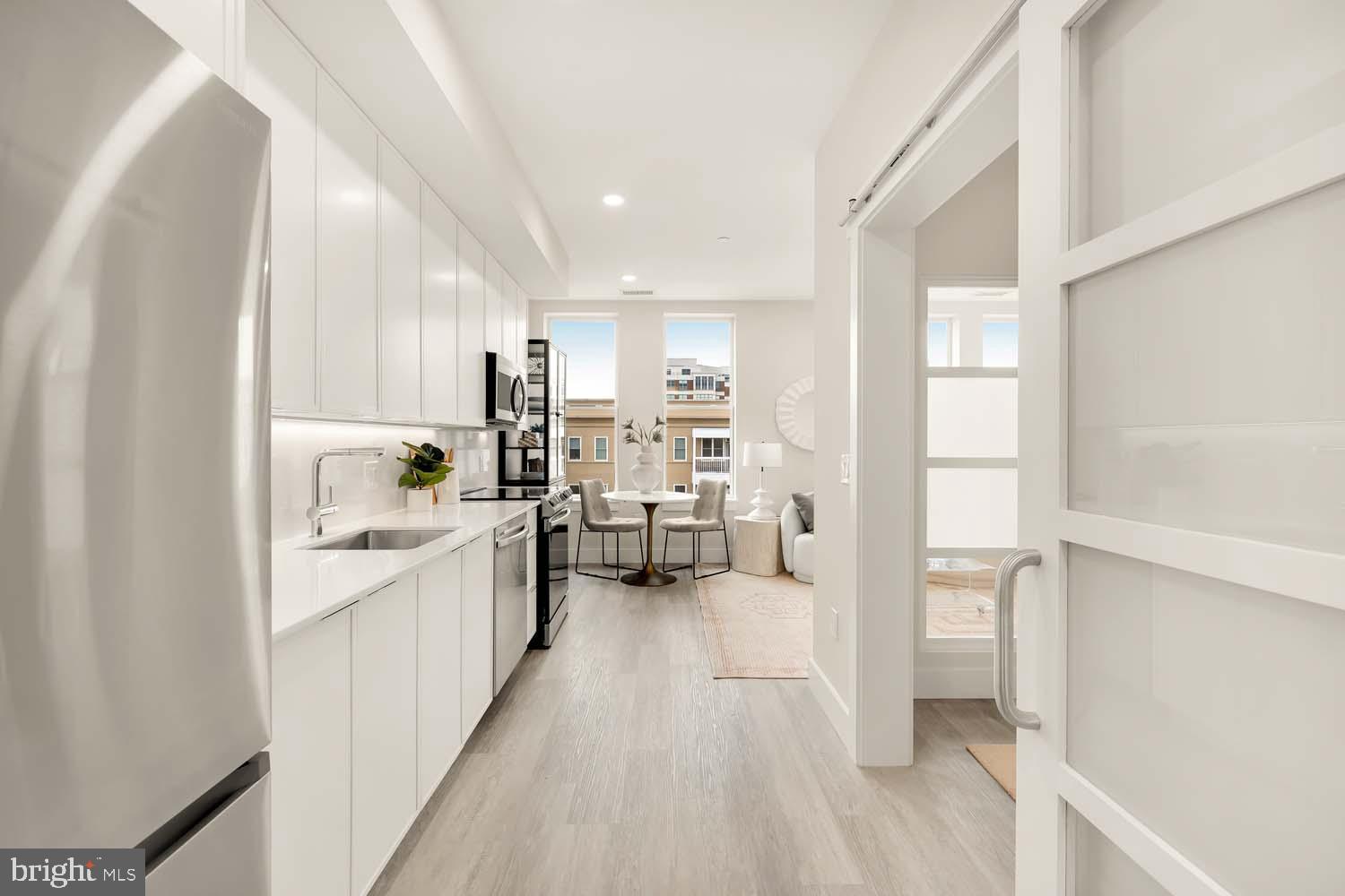 2005 11th Street Northwest, Unit 502 Washington, DC 20001 - Photo 14 of 20 Modern kitchen with sleek finishes and light.