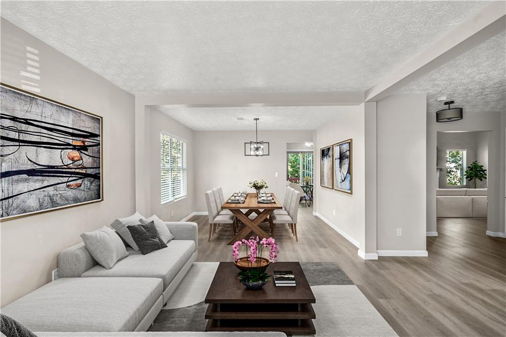 826 Shore Drive Lithonia, GA 30058 - Photo 15 of 42 a living room with furniture window and wooden floor