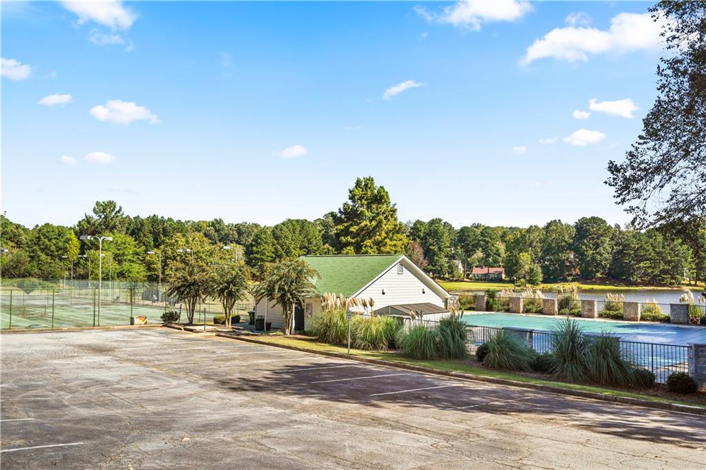 826 Shore Drive Lithonia, GA 30058 - Photo 40 of 42 a view of a house with a yard and a street view