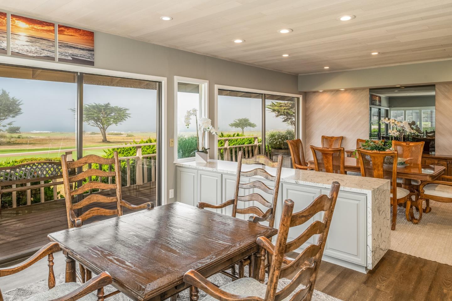 1020 Rodeo Road Pebble Beach, CA 93953 - Photo 22 of 38 a view of a dining room with furniture window and wooden floor