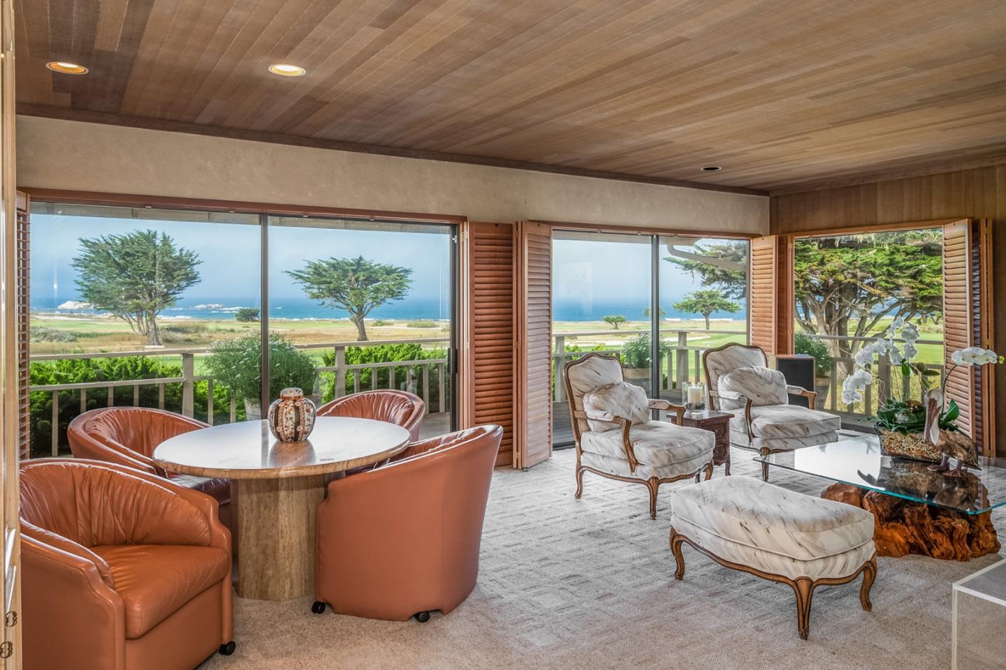 1020 Rodeo Road Pebble Beach, CA 93953 - Photo 7 of 38 a living room with furniture and a potted plant