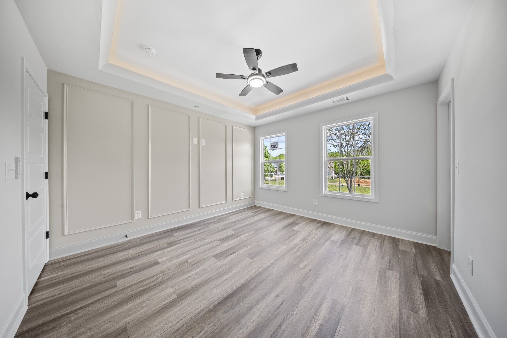130 Gower Street Pleasant View, TN 37146 - Photo 12 of 30 wooden floor in an empty room with a window