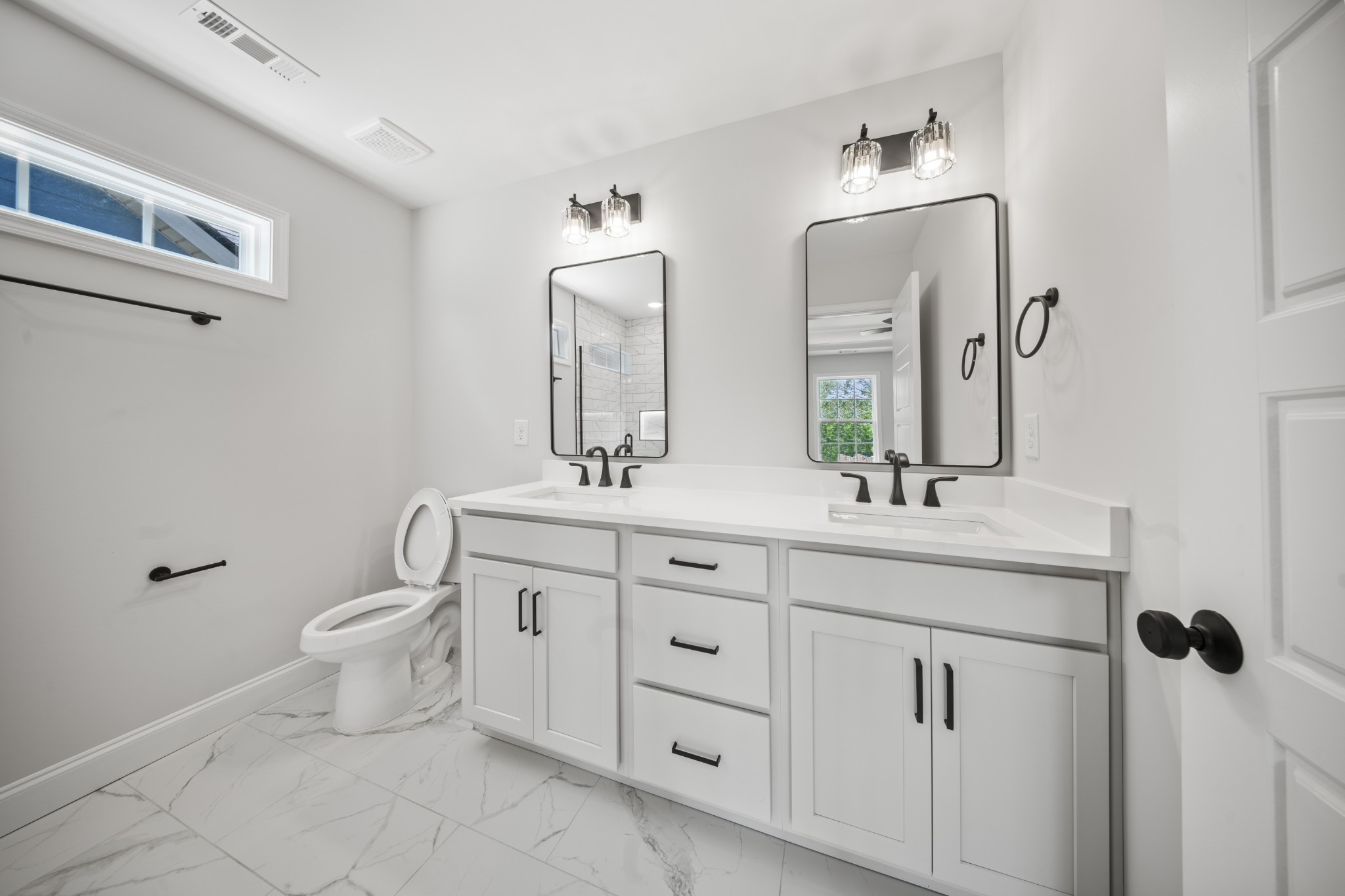 130 Gower Street Pleasant View, TN 37146 - Photo 17 of 30 a bathroom with a toilet sink and mirror