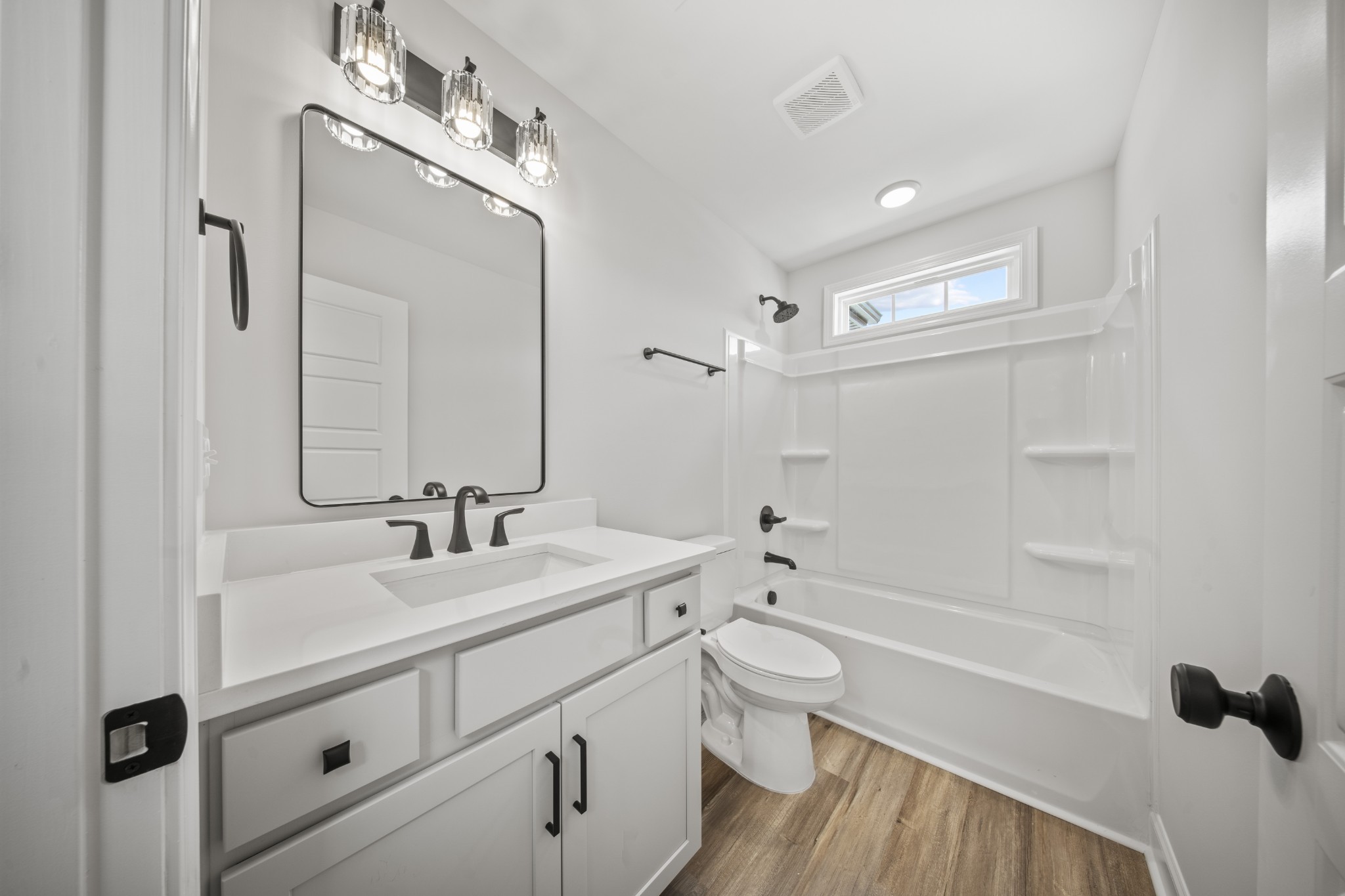 130 Gower Street Pleasant View, TN 37146 - Photo 21 of 30 a bathroom with a sink a toilet and shower