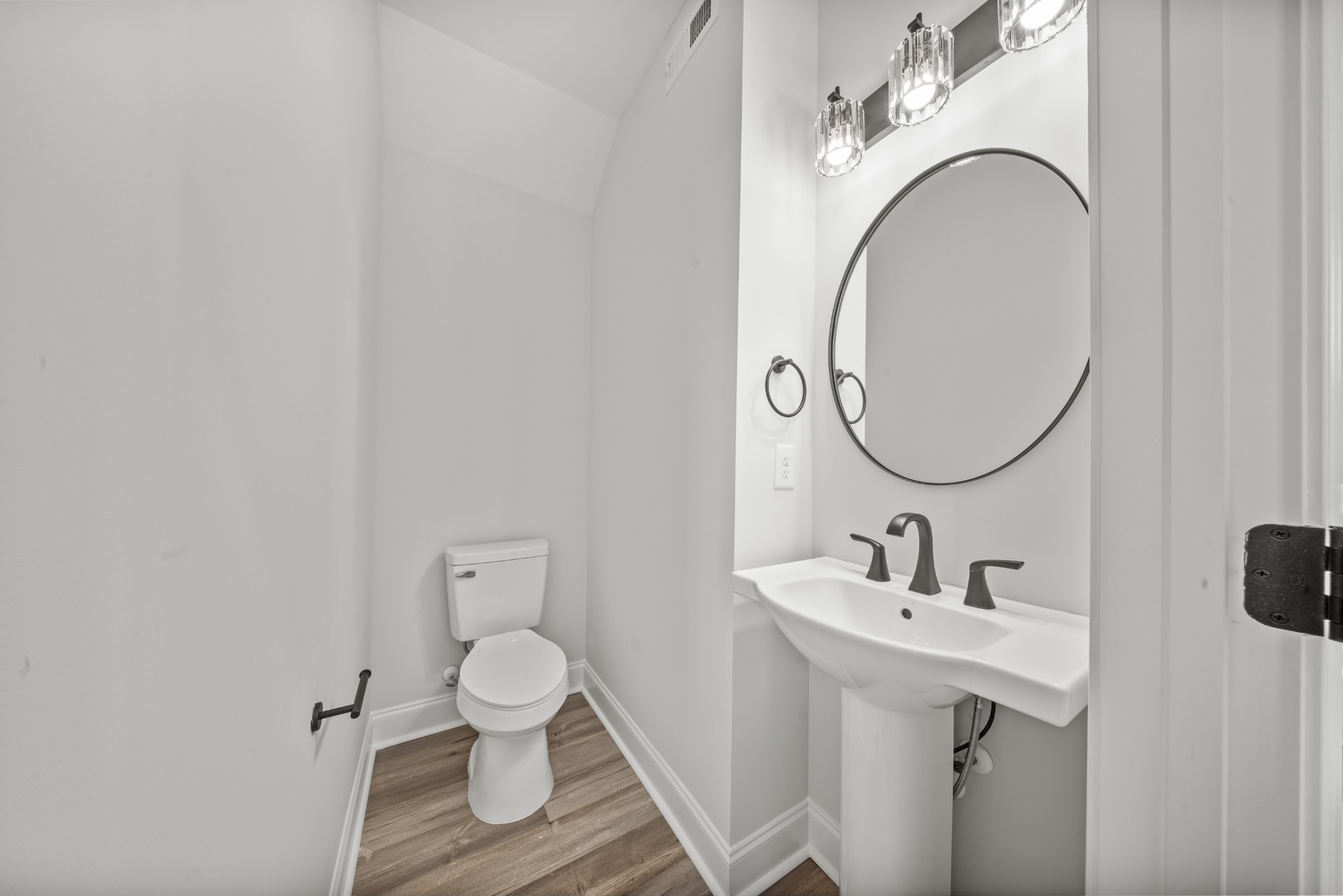 130 Gower Street Pleasant View, TN 37146 - Photo 23 of 30 a bathroom with a toilet a sink and a mirror