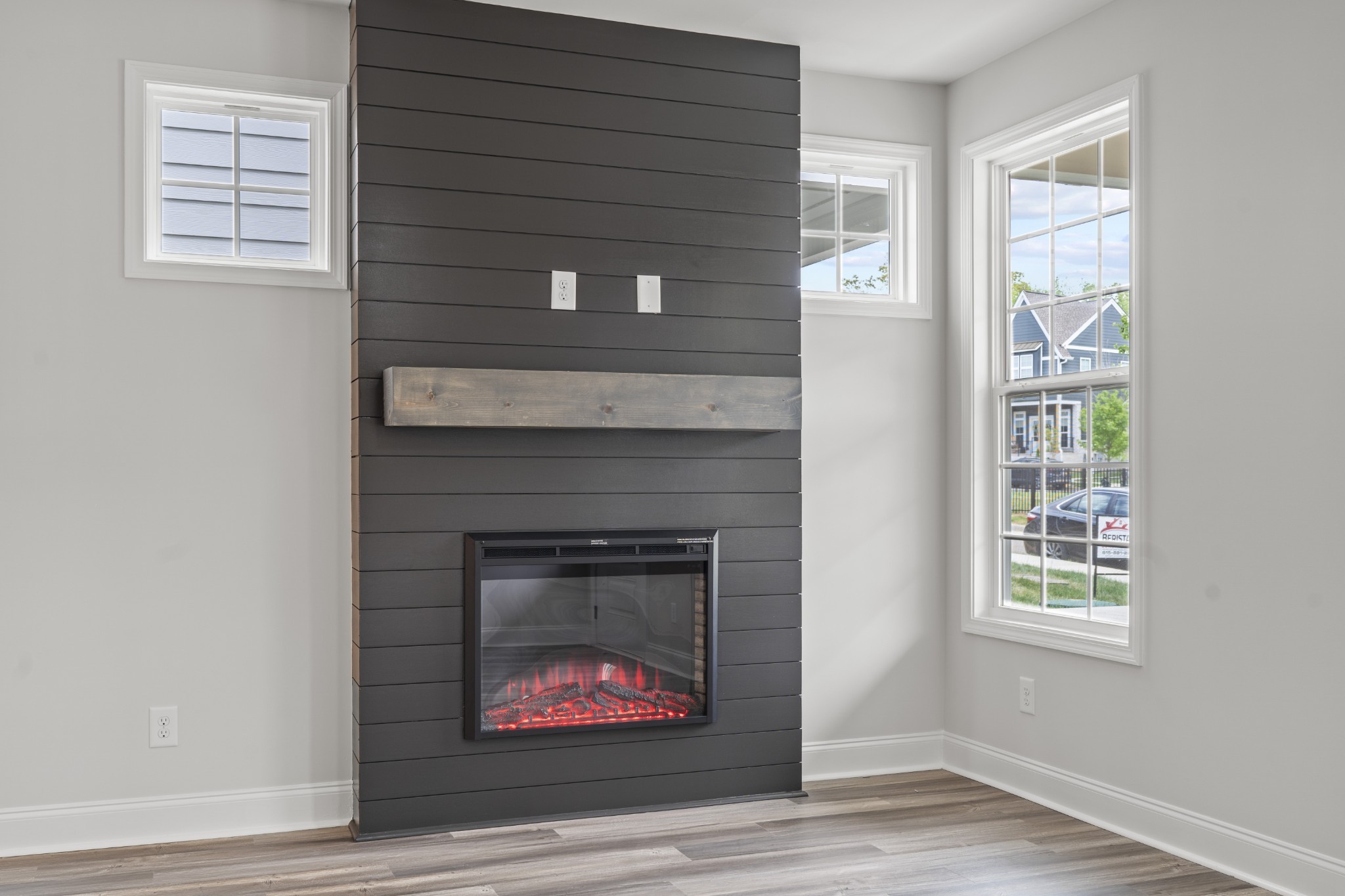 130 Gower Street Pleasant View, TN 37146 - Photo 4 of 30 a living room with a fireplace cabinets and a window