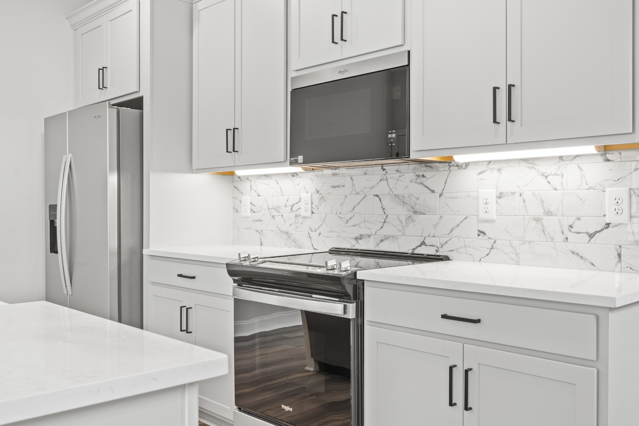 130 Gower Street Pleasant View, TN 37146 - Photo 8 of 30 a kitchen with granite countertop cabinets appliances and a sink