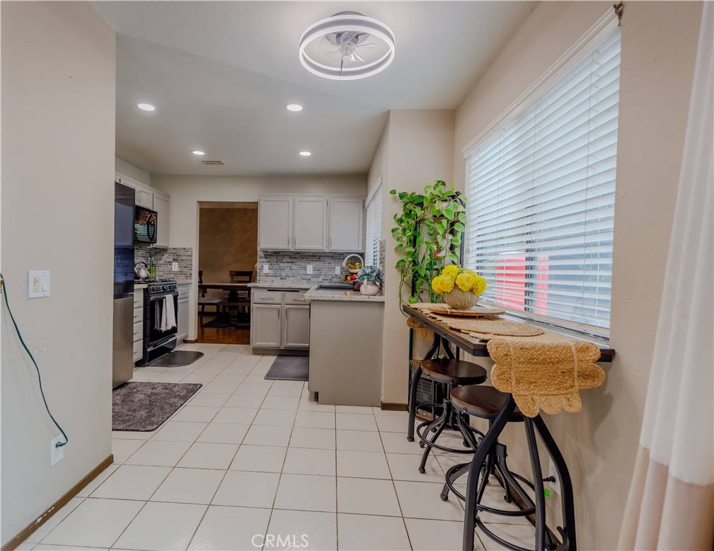 2124 Snowberry Court Simi Valley, CA 93063 - Photo 11 of 23 a kitchen with a sink appliances and cabinets