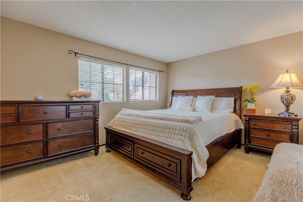 2124 Snowberry Court Simi Valley, CA 93063 - Photo 12 of 23 a bed room with a bed and a dresser