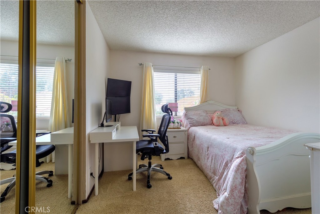 2124 Snowberry Court Simi Valley, CA 93063 - Photo 17 of 23 a bedroom with a bed and a desk
