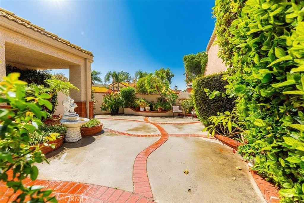 2124 Snowberry Court Simi Valley, CA 93063 - Photo 19 of 23 a view of a swimming pool with potted plants