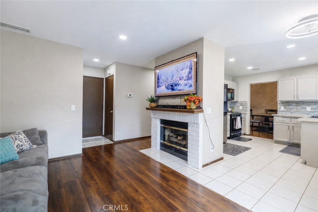 2124 Snowberry Court Simi Valley, CA 93063 - Photo 8 of 23 a kitchen with stainless steel appliances a stove a refrigerator and a oven