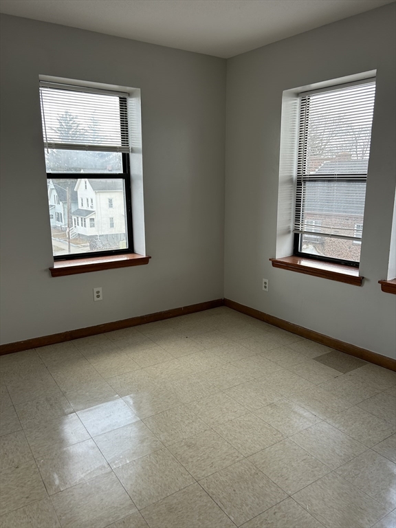 888 State Street, Unit 44 Springfield, MA 01109 - Photo 3 of 3 an empty room with windows
