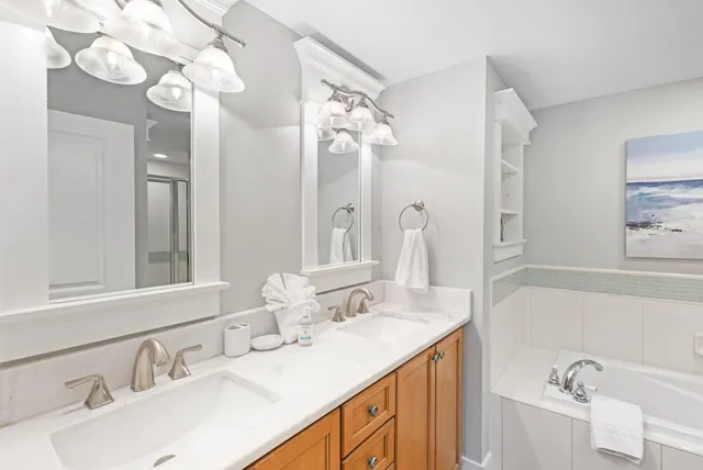 a bathroom with a bathtub and a shower