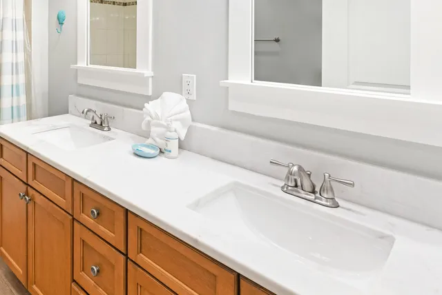 a bedroom with bed and window