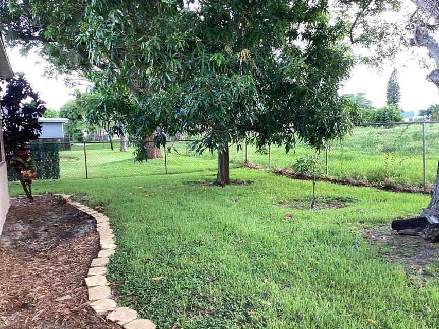 107 Timber Run West Riviera Beach, FL 33407 - Photo 18 of 19 Back Yard