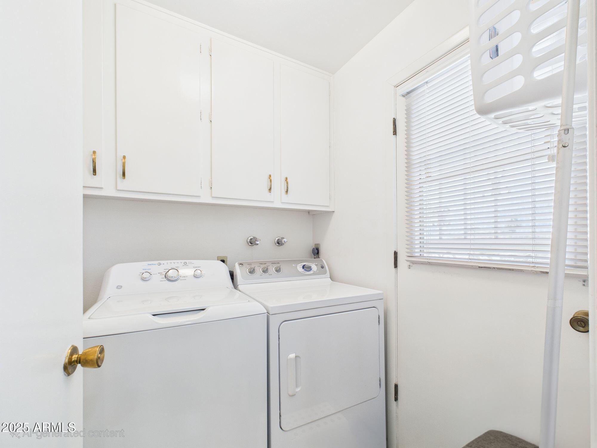 9915 West Mountain View Road Sun City, AZ 85351 - Photo 16 of 22 a utility room with dryer and washer