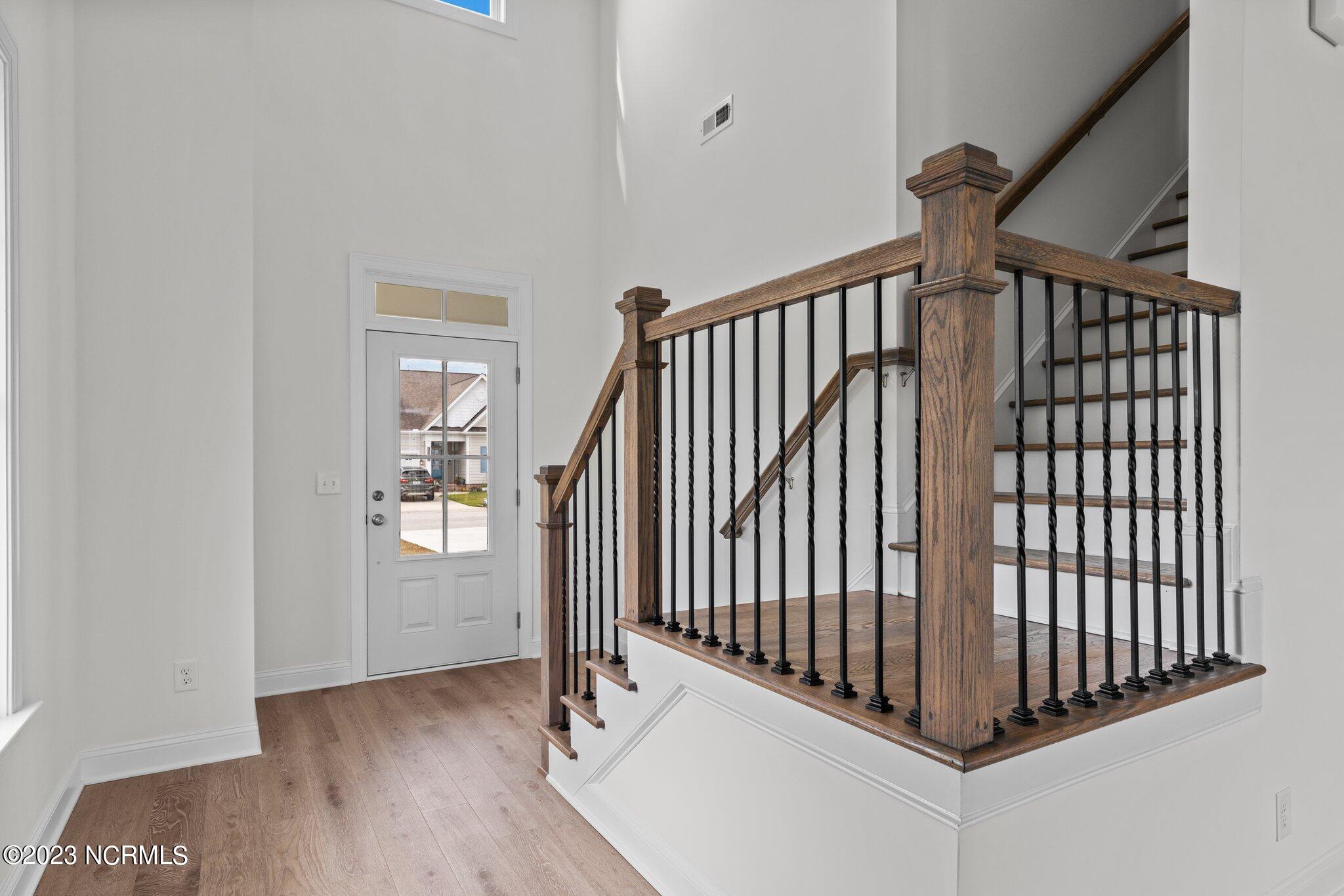 1720 Olde Farm Road Morehead City, NC 28557 - Photo 2 of 33 Oak Tread Staircase