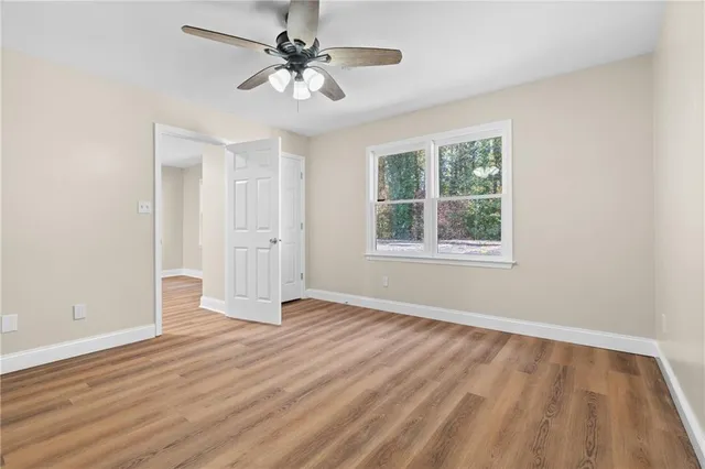 a kitchen with a stove sink and refrigerator