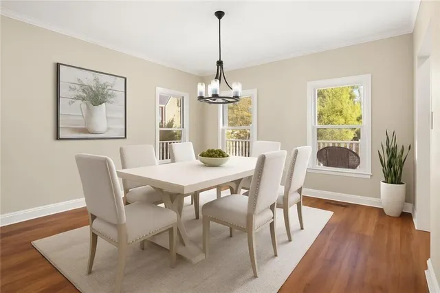 a large kitchen with stainless steel appliances kitchen island granite countertop a sink and cabinets