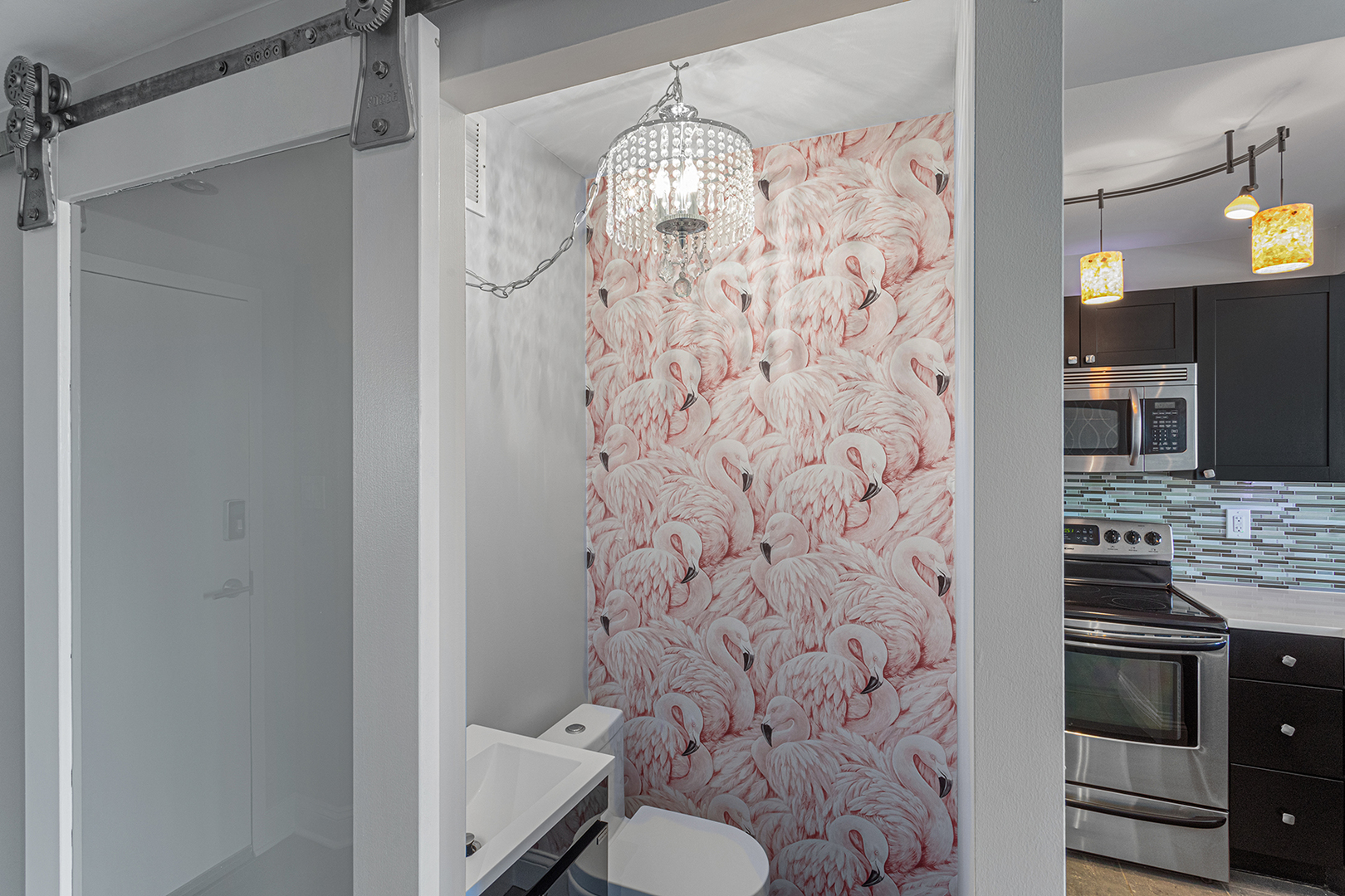 6166 North Sheridan Road, Unit 24L Chicago, IL 60660 - Photo 11 of 18 a bathroom with a granite countertop shower a toilet and a sink