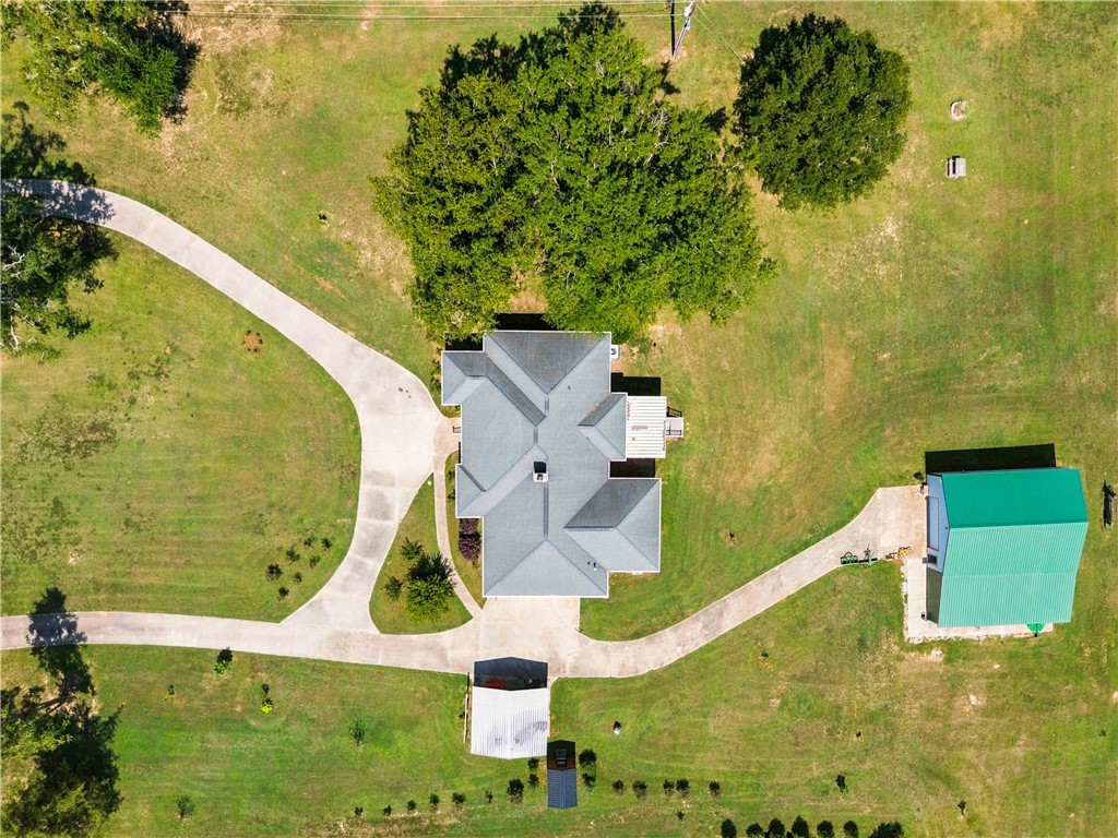 2861 Fairview Road Simpsonville, SC 29680 - Photo 38 of 42 An expansive green lawn surrounds the main residence and detached outbuildings from above.