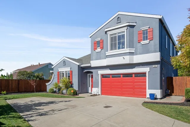 a front view of house with yard