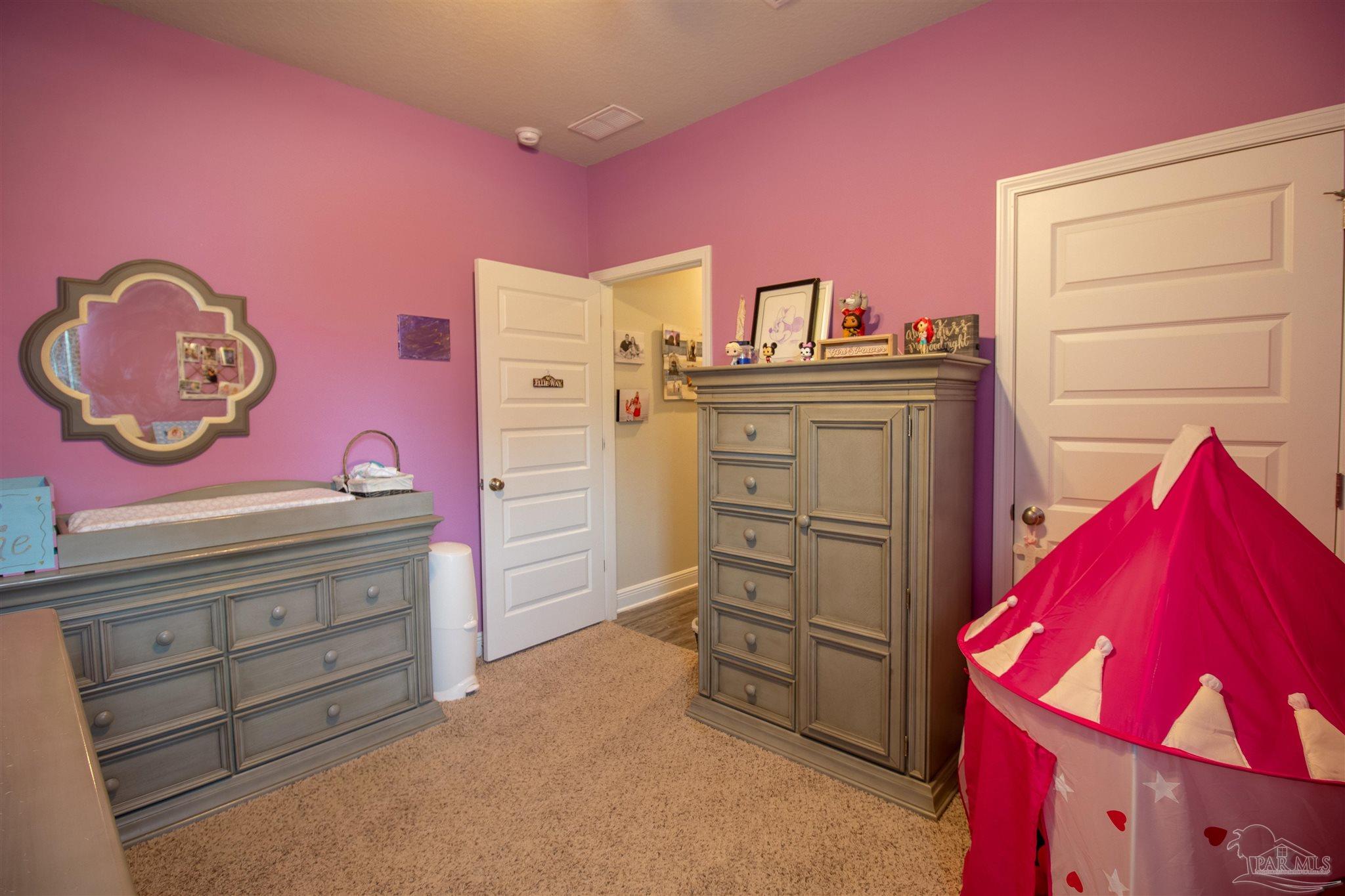 5375 Red Shoulder Road Milton, FL 32571 - Photo 26 of 38 a kitchen with a sink and cabinets
