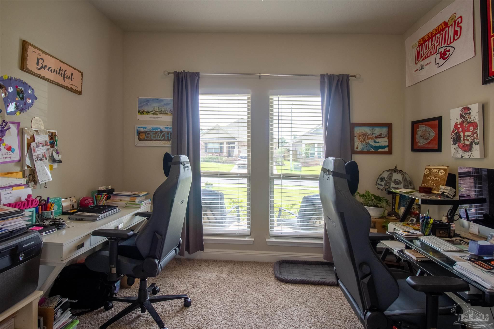 5375 Red Shoulder Road Milton, FL 32571 - Photo 30 of 38 a view of a workspace with furniture and a window