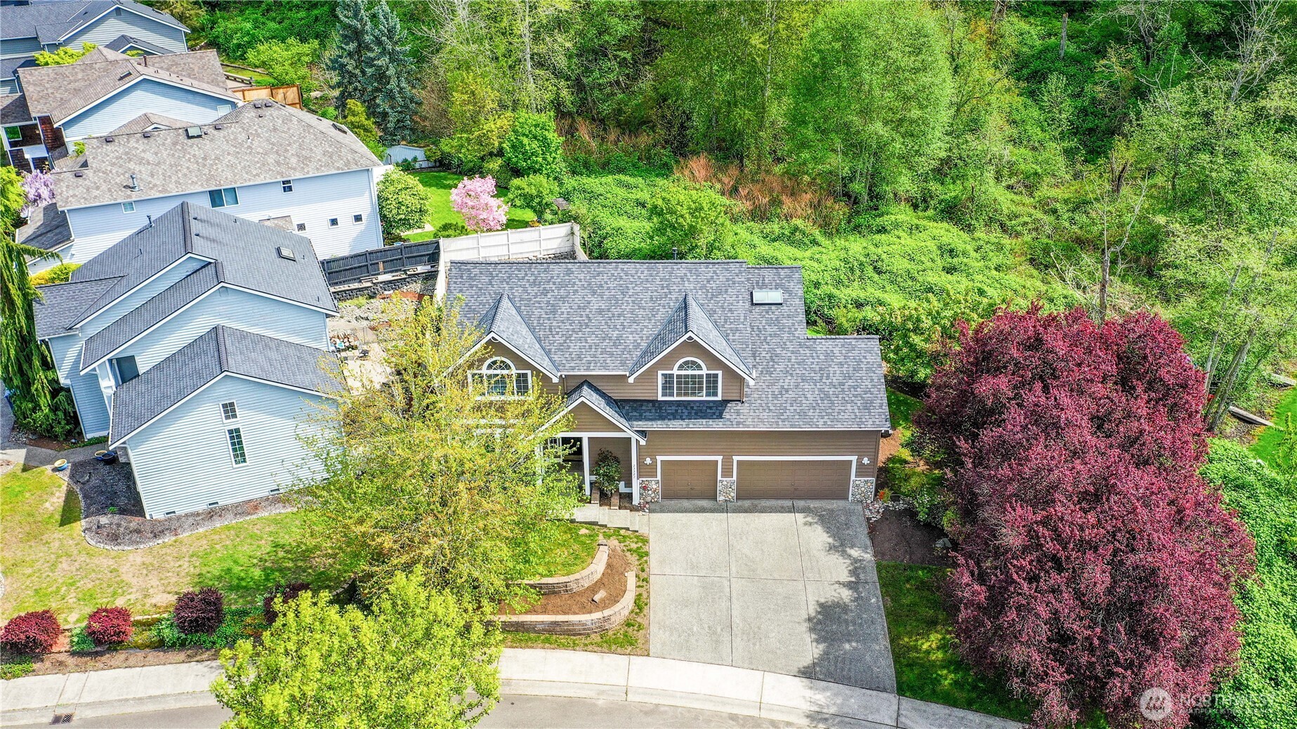 23327 8th Place West Bothell, WA 98021 - Photo 39 of 40 front view of a house with a garden