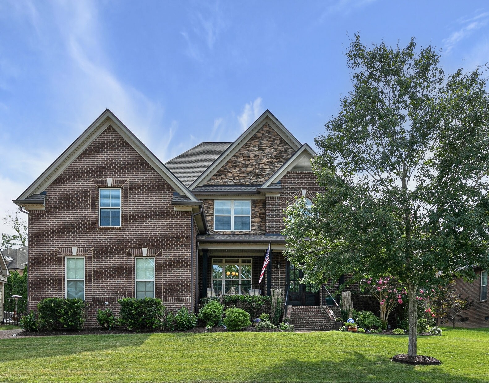 1997 Brisbane Drive Spring Hill, TN 37174 - Photo 1 of 39 a front view of a house with a yard