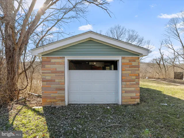 a front view of house with an outdoor space