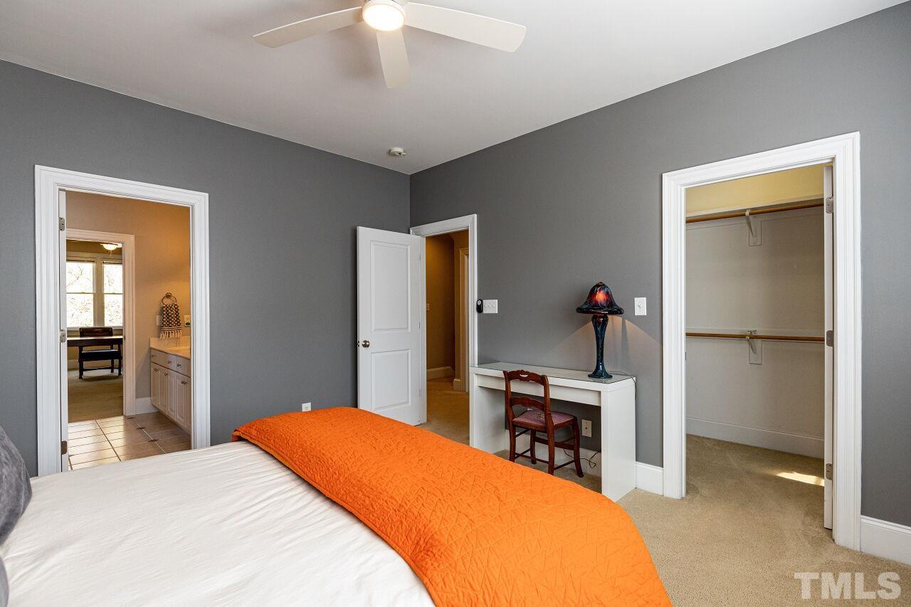 1124 Hobson Court Raleigh, NC 27607 - Photo 26 of 36 a bedroom with a bed and a desk