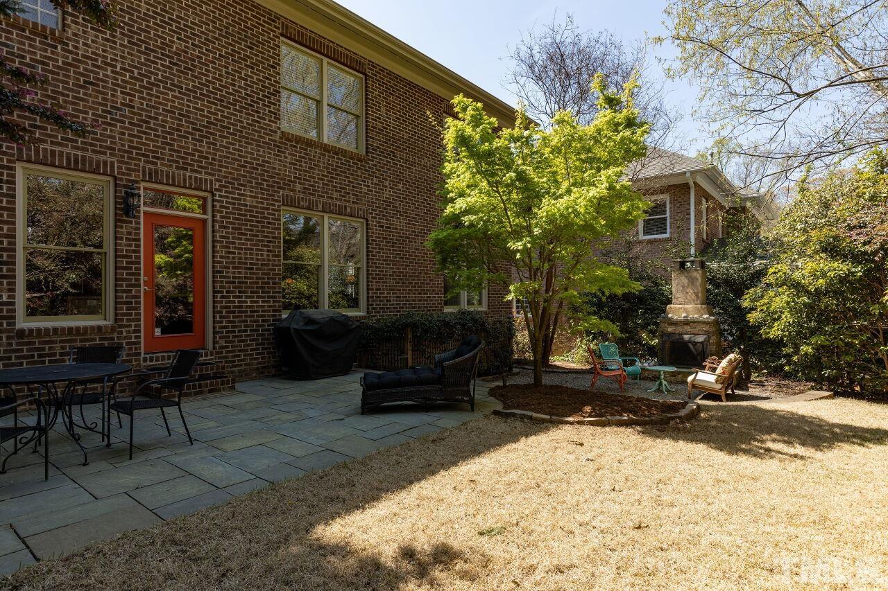 1124 Hobson Court Raleigh, NC 27607 - Photo 35 of 36 a view of a chairs and table in backyard