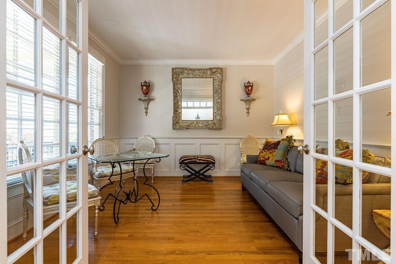 1124 Hobson Court Raleigh, NC 27607 - Photo 5 of 36 a living room with furniture and a rug