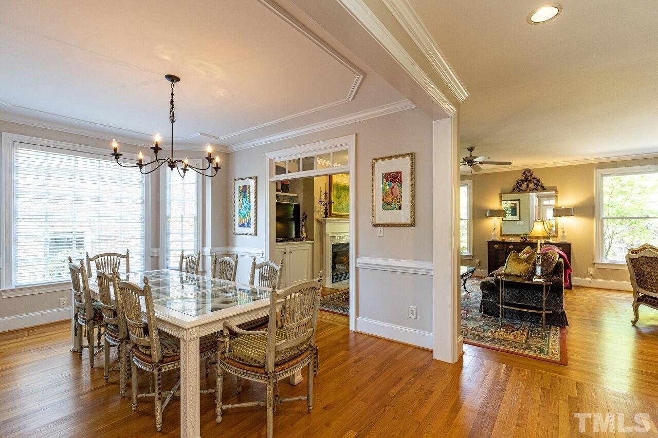 1124 Hobson Court Raleigh, NC 27607 - Photo 8 of 36 a view of a dining room with furniture window and wooden floor