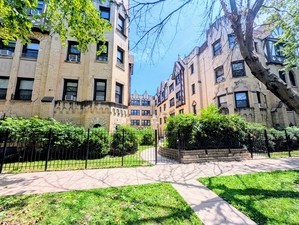 5655 North Spaulding Avenue, Unit 2W Chicago, IL 60659 - Photo 1 of 1 a view of a backyard with a garden and plants
