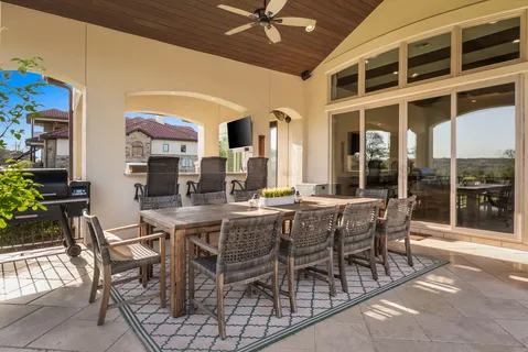 a view of balcony with furniture
