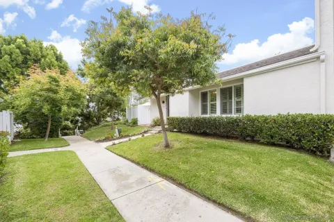 a house view with a garden space