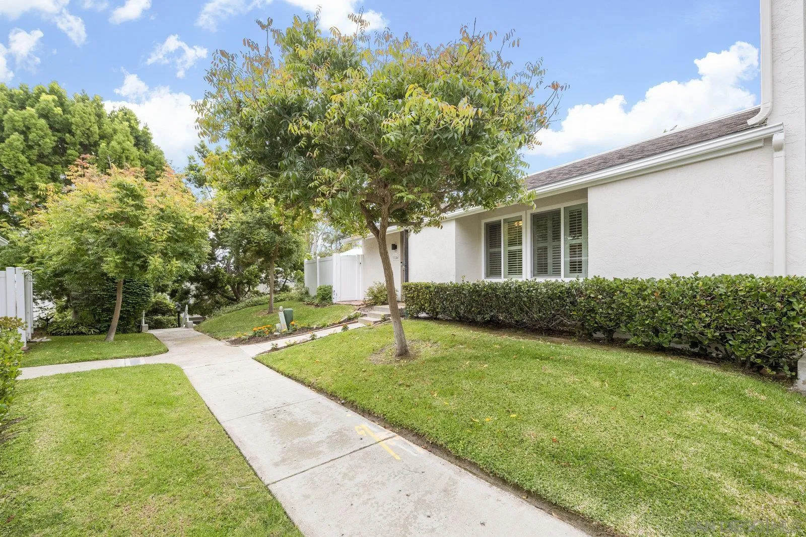 1246 Evergreen Drive Cardiff, CA 92007 - Photo 2 of 23 a house view with a garden space