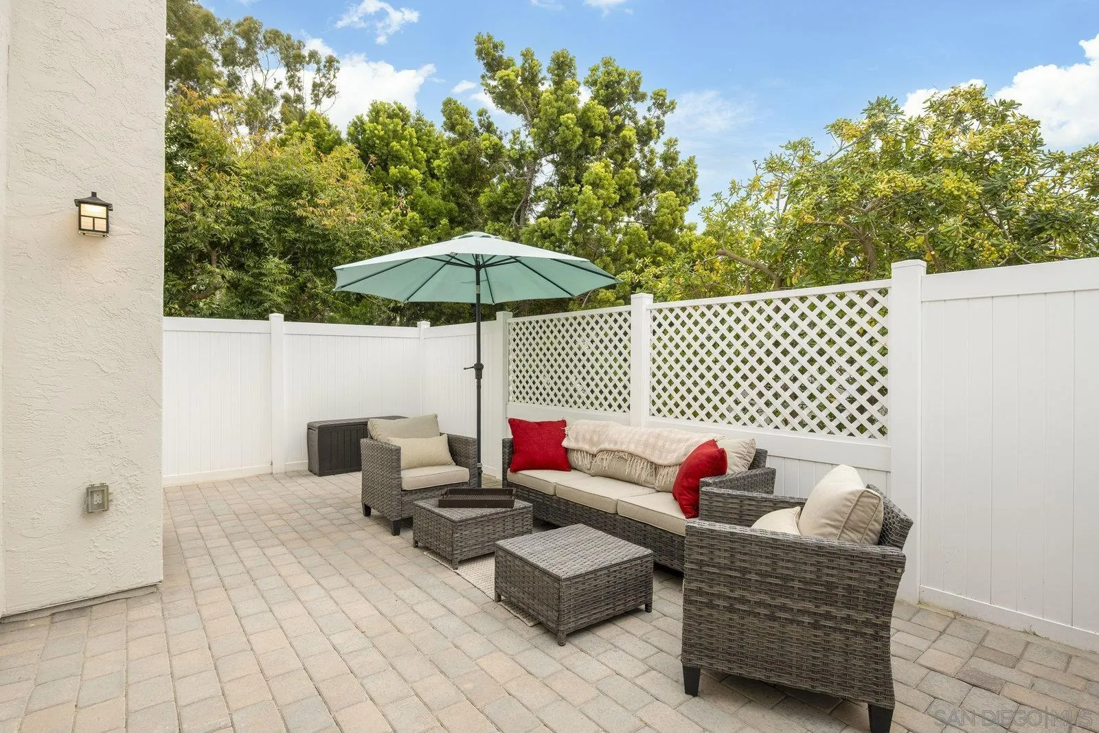 1246 Evergreen Drive Cardiff, CA 92007 - Photo 3 of 23 a outdoor living space with furniture and umbrella