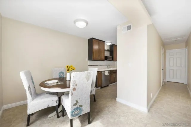 a workspace with furniture and wooden floor