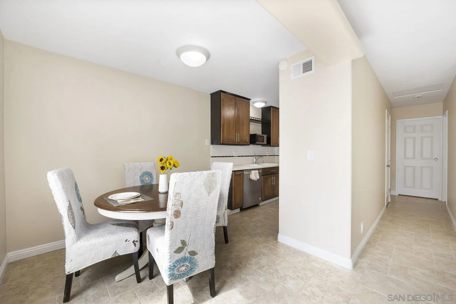 1246 Evergreen Drive Cardiff, CA 92007 - Photo 10 of 23 a workspace with furniture and wooden floor